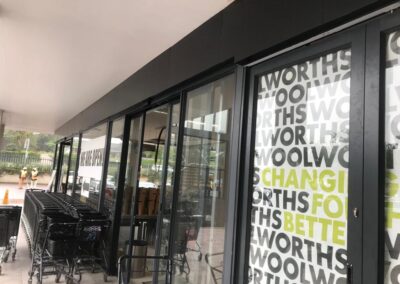 Aluminium shopfront doors in a modern retail space, showing the durability of aluminium shopfronts
