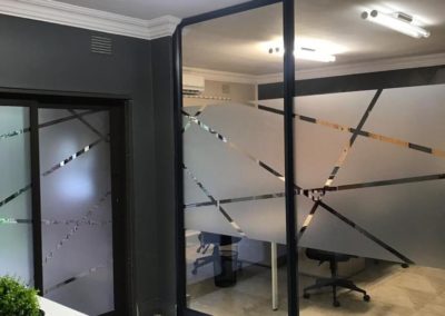 This is an image representing Glass Partitioning and Drywalling in Office