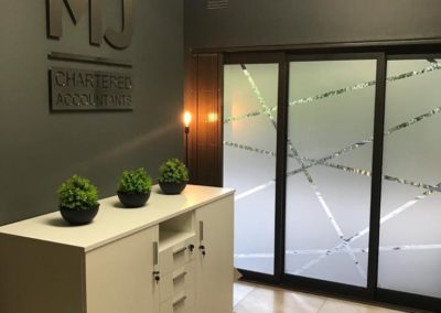 This is an image representing Glass Partitioning and Drywalling in Office