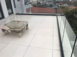 Choosing the right aluminium balustrades - Frameless balustrades installed on a balcony in Durban.