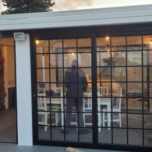 This is an image representing Veranda Enclosures & Conservatories