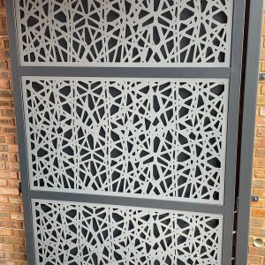 Decorative perforated gates KZN design with laser-cut patterns, combining visual appeal, privacy, and airflow control.